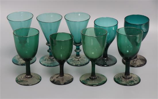 Nine various 19th century green wine glasses